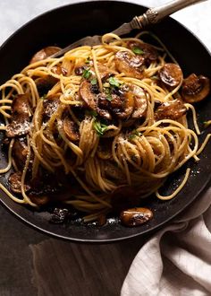 pasta with mushrooms and parmesan in a skillet