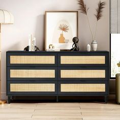 a black and tan dresser in a living room