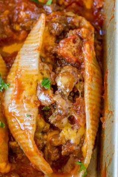 baked chicken with tomato sauce and parmesan cheese in a casserole dish