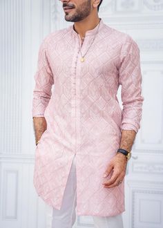 Includes: Kurta Pajama Color: Pink Work Technique: Self EmbossedDescription: Mohazzab - 02 Pink Self Embossed Kurta With Pajama This is a 2 Piece Stitched Outfit.Note: Color of this outfit may slightly vary due to photographic lighting sources or your monitor settings. Pink Color Kurta For Men, Pestal Colour Men Kurta, Pink Kurta Pajama Men, Light Pink Kurta For Men, Kurta Pajama Men Design, Kurta For Men Traditional, Men In Kurta, Pink Kurta For Men, Mens Ethnic Wear Kurta