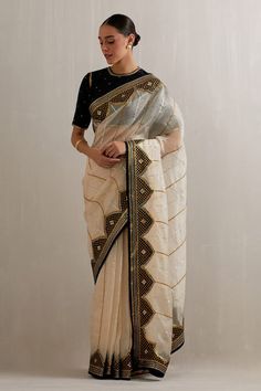 Beige, black colorblock saree with geometric applique, aari, sequin, zari embroidery. Paired with half sleeve embroidered blouse and petticoat. - Aza Fashions Designer Festive Saree With Mirror Work, Designer Saree With Mirror Work For Festive Occasions, Designer Saree With Pallu For Reception, Designer Saree With Cutdana For Reception, Designer Cutdana Saree For Reception, Designer Saree With Mirror Work, Designer Pre-draped Saree With Resham Embroidery, Designer Saree With Resham Embroidery, Designer Transitional Saree