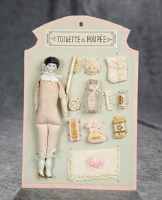 a doll is posed in front of a display