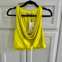 Brand New, Never Worn With Tags. Zara- Bright Yellow, 100% Viscose. Size Small. Smoke Free Home. Kept In Temperature Controlled Environment. No Rips, Odors, Flaws Or Stains. Cowl Neck 100% Viscose Size Small Imported Fits True To Size Measurements: Bust- 33-34” Waist- 26-27” Yellow Zara Top For Party, Zara Yellow Party Top, Yellow Crop Top For Night Out In Spring, Black Sleeveless Crop Top, Zara Ruffle Top, Plaid Crop Top, Zara Crop Top, Sequin Crop Top, Denim Crop Top