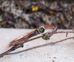 Bangle copper bracelet Rustic jewelry Bangles hammered copper Anniversary gift for wife Raw gemstone bracelets Boho Jewelry Minimalistic Reach for the sun with the Peridot crystal, an effervescent stone that harnesses the life-giving energy that turns night into day. The Vitamin D of your healing crystal collection, the Peridot crystal meaning is connected to the sun, making it your spiritual cheerleader that keeps you on the sunny side of life. The Peridot crystal shines like a light beam of en Electroformed Copper Bangle, Jewelry Bangles, Bracelets Boho, Copper Anniversary Gifts, Copper Anniversary, Peridot Crystal, Anniversary Gift For Wife, Contemporary Ring, Rustic Jewelry