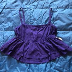 Cute Peplum Style With Tie Back. Currently Nwt. Adjustable Straps Chic Purple Summer Tops, Purple Beach Top For Summer, Purple Summer Beach Top, Summer Beach Purple Top, Purple Sleeveless Tops For Beach Season, Purple Summer Top For Beach Season, Purple Fitted Tops For Beach Season, Purple Fitted Top For Beach Season, Fitted Purple Tops For Beach Season