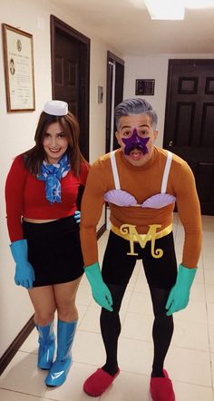 two people in costumes standing next to each other