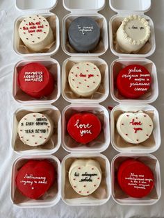 an assortment of cupcakes in plastic containers with writing on the top and bottom