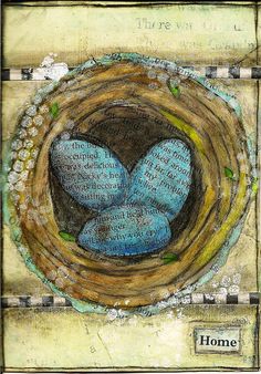 a blue bird's nest with two blue birds in it and the words home written on