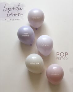 five balloons are lined up in a row on top of a white surface with the words lavender dream written above them