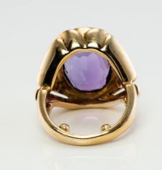 Amethyst Ring, February Birthstone, Purple Ring, Cocktail Ring, Natural Diamonds, Vintage 14K Gold, Purple Amethyst Natural Diamond Ring, Oval Ring. This stunning vintage ring is finely crafted in solid 14K Yellow Gold (carefully tested and guaranteed) and set with Earth mined natural Amethyst and genuine Diamonds. The center oval cut amethyst measures 18mm x 13mm (14.00 carats!) and this is a very clean and transparent stone with great intensity and strong brilliance. The genuine Amethyst is ac Formal Cabochon Amethyst Ring Fine Jewelry, Art Deco Yellow Gold Amethyst Ring For Formal Occasions, Yellow Gold Amethyst Ring Stamped 14k, Collectible Yellow Gold Amethyst Ring Stamped 14k, Collectible 14k Yellow Gold Amethyst Ring, Diamond Ring Oval, Amethyst Ring Vintage, Purple Ring, Gold Amethyst Ring