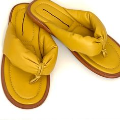 Sold Out Online! New Free People Vicenza Puffy Thong Sandals Color: Yellow, Golden Yellow, Mustard Yellow. Size: 6 Leather. Puffed Straps. Slip-On. Marked To Prevent Store Returns. Please See All Photos. No Box. Boho Bohemian Summer Trend Runway Fashion Trendy Cheap Orange Slip-on Sandals, Comfortable Flip Flops For Spring Outings, Comfortable Spring Flip Flops For Outings, Spring Single Toe Strap Flip Flops For Summer Outings, Single Toe Strap Flip Flops For Spring Summer Outings, Single Toe Strap Flip Flops For Summer Outings, Summer Toe Loop Flip Flops With Cushioned Footbed, Summer Toe Loop Flip Flops With Removable Insole, Toe Post Flip Flops For Summer Outings