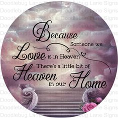 a round sign with the words because love is in heaven there's a little bit of heaven in our home