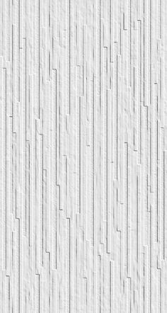 a white textured wallpaper with vertical lines in the center and diagonals on it