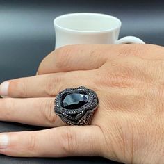 Product Description: Introducing our limited edition Turkish Black Onyx Ring Handmade with precision and care by our skilled artisans. This exquisite ring is designed to impress with its unique and sophisticated appeal. The Lustrous black onyx stone is a Show-Stopper, radiating an Elegant and striking vibe. What makes this piece even more special is the incredible Discount of 71% OFF, making it an irresistible steal. Don't miss the opportunity to own this one-of-a-kind piece at an unbeatable pri Silver Market, Turkish Ring, Onyx Color, Turkish Rings, Onyx Colour, Fake Jewelry, Black Onyx Stone, Jewelry Black, Black Onyx Ring