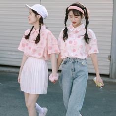 These Peach Print Blouses are the perfect addition to your cute and kawaii wardrobe. Available in white or pink, these blouses feature a playful print of delicate peaches, adding a touch of whimsy to your outfit. The lightweight and airy fabric makes them perfect for any season, keeping you cool in the summer and easily layering for the cooler months. These blouses feature a relaxed fit and short sleeves, making them ideal for casual outings or dressier occasions. Pair them with high-waisted jea Playful Short Sleeve Blouse, Sweet Pink Summer Tops, Sweet Pink Summer Top, Kawaii Style Blouse For Spring, Summer Kawaii Blouse, Cute Pink Blouse For Spring, Spring Kawaii Blouse, Cute Pink Spring Blouse, Cute Strawberry Print Tops For Spring