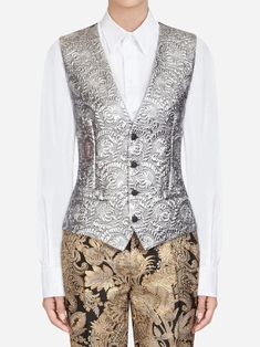 Dolce & Gabbana is your calling card if you're looking for feminine romance. The eye drawn to ornate embellishments, exquisite flower motifs, and look-at-me lace. This Baroque Waistcoat has a pattern, metallic sheen, front button closure. Your Calling, Floral Vests, Jacquard Jacket, Flower Motifs, Cotton Long Dress, Silver Silk, Calling Card, Tuxedo Style, Silk Dress Long