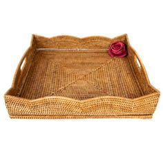 a wicker tray with a red rose on the top and bottom, isolated against a white background