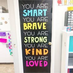 a sign that says you are smart you are brave you are strong you are kind of loved