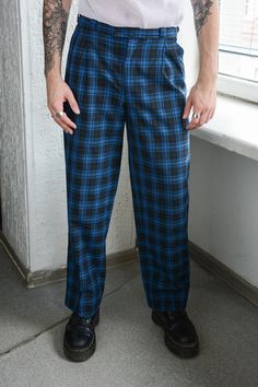 Vintage blue checked trousers with pockets and loops for a belt. 51% polyester, 49% cotton. UK size not written but looks like S. Model size on the photo is S. Measurements: length 46 inches, waist 31 inches, hips 41 inches. Plaid Workwear Bottoms With Belt Loops, Casual Plaid Bottoms With Welt Pockets, Casual Plaid Bottoms With Belt Loops, Plaid Cotton Pants For Work, Cotton Plaid Pants For Workwear, Plaid Cotton Workwear Bottoms, Plaid Cotton Bottoms For Work, Checked Trousers, Mens Trousers