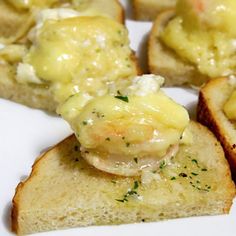 slices of bread topped with cheese and sauce