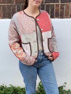 This is a cropped quilted jacket made from a beautiful fall thrifted quilt. The jacket is osfm (one size fits many) and can fit up to women's size XL. Casual Winter Outerwear With Floral Patchwork, Casual Floral Patchwork Outerwear For Winter, Quilted Multicolor Outerwear For Fall, Retro Button-up Patchwork Outerwear, Vintage Cotton Quilted Jacket For Fall, Quilted Cropped Jacket For Fall, Fitted Cotton Quilted Jacket For Fall, Vintage Winter Outerwear With Floral Patchwork, Casual Patchwork Quilted Jacket For Fall