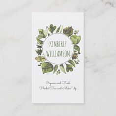 a white card with green watercolor leaves and the words kimberly williamson on it