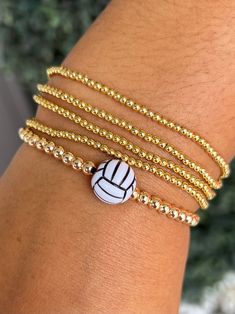 Our beaded bracelets are the perfect combination of fun and class.  After all, life is too short to be boring!  Add our Volleyball Bracelet to your collection.  They make a perfect gift for your captain or teammates! Features: -elastic stretch band -18K Gold plated brass beads(4mm) -6 inches around  -tennis ball