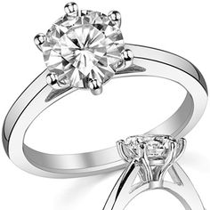 a white gold engagement ring with a diamond