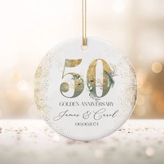 Celebrate the unparalleled joy of 50 golden years of marriage with our exquisitely crafted 50th Golden Wedding Anniversary bauble keepsake.  This personalised ceramic ornament is the perfect memento to honour a half-century of love and devotion. Each bauble is meticulously handcrafted from high-quality ceramic, making it a timeless piece that adds elegance to any celebration. Measuring 7cm in diameter, it fits beautifully on any display shelf, or keepsake box The smooth ceramic finish ensures th 50th Golden Anniversary, Ceramic Making, 50 Golden Wedding Anniversary, 50th Anniversary Celebration, Golden Wedding Anniversary, Golden Anniversary, Golden Wedding, Golden Years, Display Shelf