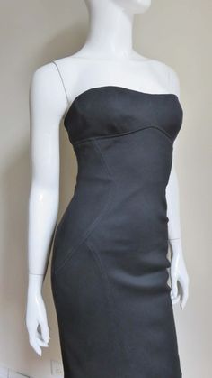 For Sale on 1stDibs - A fabulous black silk jersey strapless dress from Gianni Versace Couture. It is fitted with flattering seaming and the center back has functional on the Backless Silk Dress, Silk Strapless Dress, Green Knit Dress, Versace Couture, Versace Brand, Lace Up Dress, Runway Dresses, 90s Dress, Gianni Versace