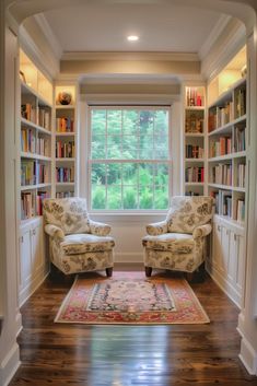 a room with two chairs and a rug on the floor in front of a window