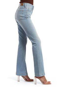 Add a vintage vibe to your casual looks with stretchy, curve-hugging flare jeans featuring trouser-style hems and a faded light wash. 21 1/2" leg opening; 9 1/2" front rise; 15" back rise Zip fly with button closure Five-pocket style 65% cotton, 13% lyocell, 13% polyester, 7% recycled cotton, 2% elastane Machine wash, line dry Made in Turkey Fitted Flare Jeans With Frayed Hem, Fitted Wide Leg Flares With Frayed Hem, Fitted Light Wash Flare Jeans, Fall Light Wash Full Length Flare Jeans, Fitted Denim Blue Flares With Flared Hem, Casual Light Wash Flares For Fall, Mid-rise Blue Flares For Fall, High Rise Light Wash Stretch Flares, Light Wash Flare Jeans For Fall