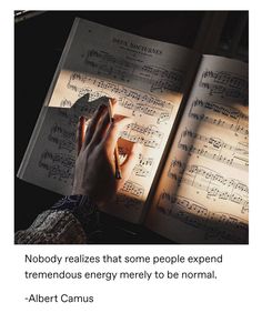 someone is reading a book with music notes on it and the caption reads nobody releases that some people spend tremendous energy to be normal