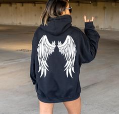 "Angel Hoodie, Aesthetic Hoodie, Vsco Hoodies, Pinterest Designs, Sweatshirt Hoodies, Wings Hoodie, Trendy Hoodies, Design On The Back Hoodie *We offer all variations of this design, including hoodies, sweatshirts, and shirts. If you cannot find the specific version you desire, please reach out to us, and we will be delighted to assist you.* *We can incorporate any design or image you wish on our hoodies, shirts, and sweatshirts. If you have a design in mind or a particular image you'd like to h Vsco Hoodies, Angel Wings Hoodie, Angel Hoodie, Hoodie Aesthetic, Trendy Hoodies, Aesthetic Hoodie, Harajuku Streetwear, Couples Hoodies, Loose Outfit