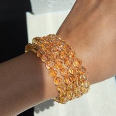 "7.5mm beads, fits up to 6 4\" wrists 🌟 Citrine is a premier stone of manifestation. Carrying the power of the sun, it is warm and comforting, energizing and life giving. it clears the mind and stirs one to action. Its frequency awakens creativity and imagination - transforming dreams and wishes into reality wth its pure yellow energy. .  Citrine does not hold or accumulate negative energy, but dissipates and grounds it, making it extremely protective for anyone who owns one. It activates your intuition, encourages sharing, promotes happiness and joy, increases your self-esteem and confidence, encourages a positive attitude, enhance concentration, helps you to overcome your fears, increases ease of communication, balances your emotions." Citrine Gemstone Beads Crystal Bracelet, Spiritual Citrine Crystal Bracelet With Gemstone Beads, Healing Citrine Crystal Bracelet With Round Beads, Citrine Gemstone Beads Crystal Bracelet As Gift, Citrine Gemstone Beads Bracelet As Gift, Citrine Crystal Bracelet Gift, Amber Citrine Crystal Bracelet With Round Beads, Amber Crystal Bracelet With 8mm Round Beads, Amber Crystal Healing Bracelet