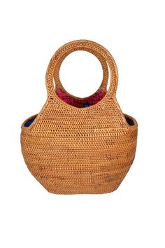 The Sanibel Bag is carefully and consciously handwoven by artisans in Bali, Indonesia using local and sustainable materials. No two bags are alike. Each bag is lined with a unique batik-patterned fabric. Body: organic ata grass Interior: lined with organic 100% cotton colorful batik-patterned fabric Large handles for easy carry Drawstring top-close Dimensions Top length = 33cm / 11in Bottom length = 18cm / 7in Width = 18cm / 7in Height = 33cm / 13in Eco-friendly Woven Bucket Bag With Top Handle, Handwoven Natural Hobo Bag With Top Handle, Woven Natural Fiber Shoulder Bag With Round Handle, Natural Handwoven Top Handle Hobo Bag, Eco-friendly Tote Shoulder Bag With Bamboo Handle, Eco-friendly Shoulder Bag With Bamboo Handle, Woven Shoulder Bag With Round Handle, Bohemian Bucket Bag With Bamboo Handle In Natural Color, Bohemian Natural Bucket Bag With Bamboo Handle