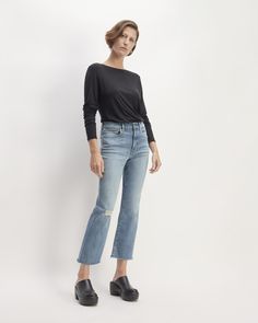 Jeans with a kick. The Kick Bootcut Jean is a fresh play on an iconic ‘90s jean silhouette. Featuring a 10.5” mid-rise and 27” ankle-length inseam, it’s fitted through the seat and thigh, with the leg kicking out into a slight flare at the ankle. It’s made with our premium OCS-certified organic cotton and LENZING™ ECOVERO™ high-stretch denim blend to hug in all the right places with comfort and ease.  LENZING™ ECOVERO™ is a man-made cellulosic fiber sourced from FSC-certified wood pulp, whic High Rise Everlane Jeans For Spring, Everlane Fitted Casual Jeans, Everlane High Rise Jeans For Spring, Everlane High-rise Spring Jeans, Everlane Mid-rise Denim Jeans, Everlane Denim Jeans For Spring, Everlane Spring Denim Jeans, Casual Everlane Jeans For Fall, 90s Jean