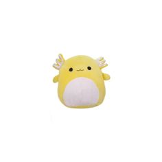 a yellow stuffed animal with horns on it's head and eyes, sitting against a white background