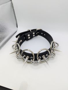 This is a collar I made from a thick Vegan/Faux leather and it is adjustable from 13 to 16 inches :) it features 1.25" O-Rings and 1- inch long spikes. Be sure to find me on IG to see more of my work :) _SxbjectDelta_ Ring Leader, Black Mountain, Goth Outfits, Cosplay Outfits, O Ring, Pretty Shoes, Piercings, Choker Necklace, Faux Leather