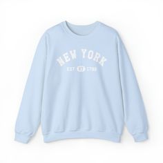 This aesthetic, cute and graphic design is perfect for those that are proud of the state of New York or NY. The design shows the year established. It is a great gift for men, women, kids, boys, girls and for her or him. All our trendy designs are unique. Ideal for any situation, a unisex heavy blend crewneck sweatshirt is pure comfort. These garments are made from polyester and cotton. This combination helps designs come out looking fresh and beautiful. The collar is ribbed knit, so it retains i Sports Sweater, Sport Sweater, Cozy Tops, I Love Ny, Bear Graphic, Great Gifts For Men, Boring Clothes, Sweater Jumper, Vintage Graphic