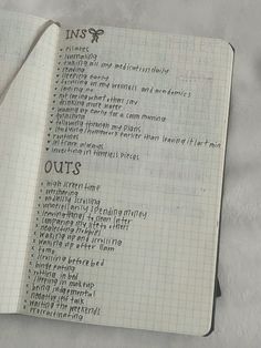 an open notebook with some writing on it