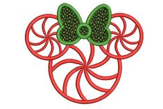 a green butterfly sitting on top of red circles