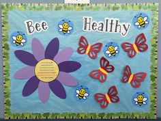 a bulletin board with butterflies and flowers on it that says, be healthy in the center