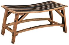 a wooden bench made out of wood with slats on the top and bottom part