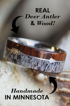 two wedding bands with arrows on them and the words real deer antler & wood handmade in minnesota