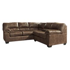 a brown leather sectional sofa on a white background