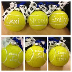 four tennis balls with the names of each team and numbers on them, all decorated in different ways