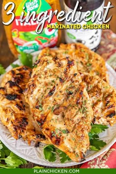 grilled chicken on a white plate with parsley and mustard in the background text reads 3 ingredient marinated chicken