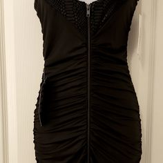 Black Raunched Dress With Front Zipper And Snake Print. Has Spike Ornaments On The Back. Material Is Black And Shiney. Dress Does Stretch. Armpit To Arm Pit Flat Is 13 In. Length From Armpit Is 28in. Mid Thigh. Black Mini Dress With Ruched Sides For Night Out, Black Bodycon Dress With Ruched Sides For Evening, Black Mini Dress With Ruched Sides For Date Night, Black Sleeveless Bodycon Dress With Ruched Sides, Black Bodycon Dress With Ruched Sides For Party, Black Ruched Bodice Bodycon Cocktail Dress, Black Dress With Ruched Sides For Date Night, Black Cocktail Dress With Ruched Sides, Black Stretch Dresses With Ruched Sides