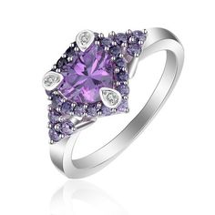 925 Sterling Silver Heart Shape Purple AAA Cubic Zirconia Ring 3 accent teardrop shape clear stones adorn the heart with surrounding round slightly lighter purple cubic zirconia WOW does she sparkle in the sun Material:925 Silver CZ Stone Ring Specification - Width:10.4mm - Length:18.5mm Stone Specification - Stone Size: 1mm,1.4mm,1.8mm,7*7mm - Stone Quantity: 3 , 17 , 6 , 1 - Stone Color: Lt Purple Purple This is one of our custom designs made especially for this collection. It is Guaranteed Ge Anniversary Wedding Band, Ring Purple, Bridal Wedding Rings, Cubic Zirconia Rings, Purple Heart, Cz Ring, Sterling Silver Heart, Womens Engagement Rings, Cz Stone